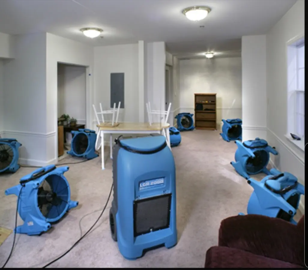 Air movers and dehumidifier setup for Water Damage Restoration in Mamakating